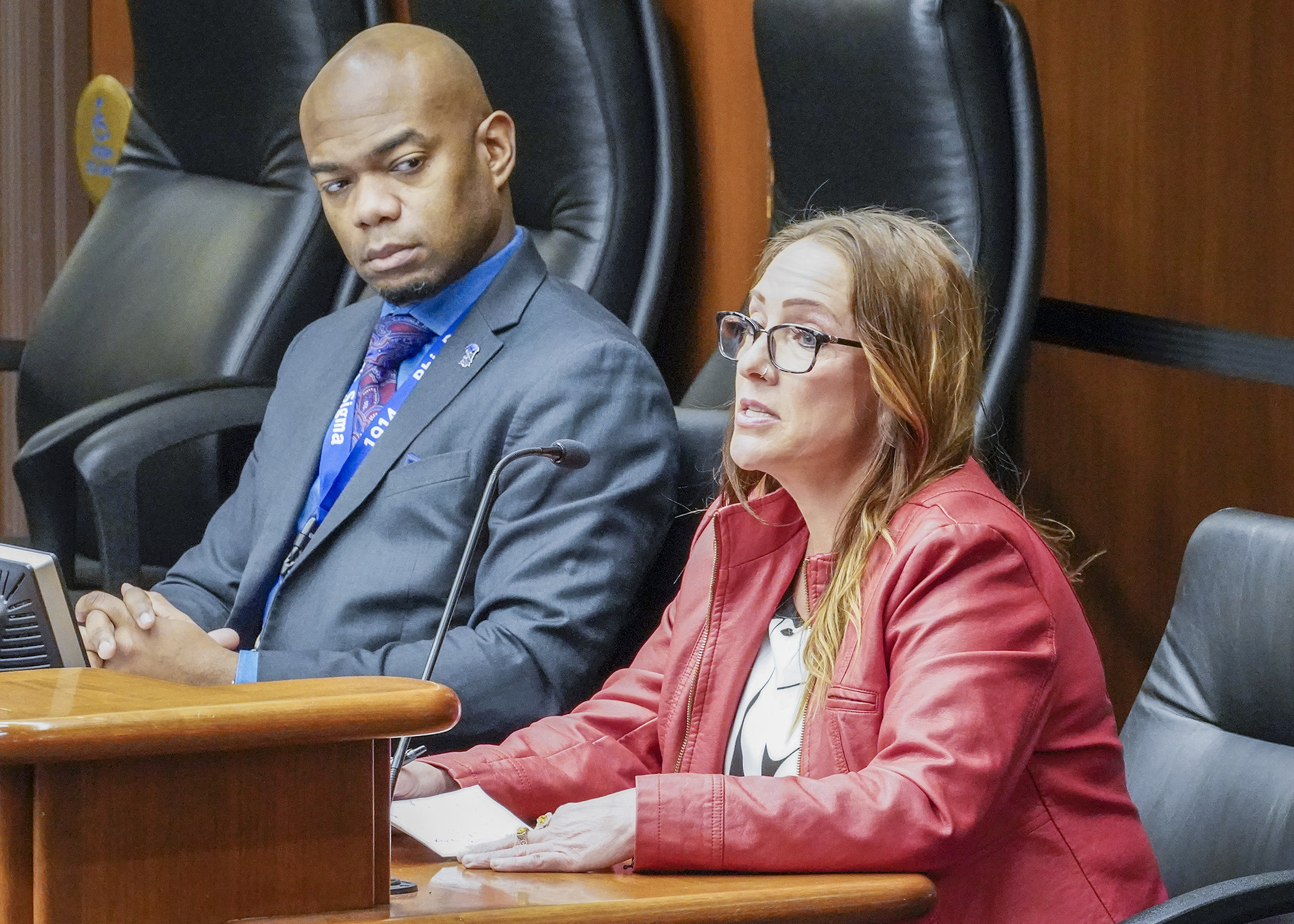Amber Jochem, a victim of mistaken identity, testifies before the House public safety committee Feb. 14 in support of a bill to help victims of identity theft clear their names in court records. Rep. Cedrick Frazier is the sponsor. (Photo by Andrew VonBank)